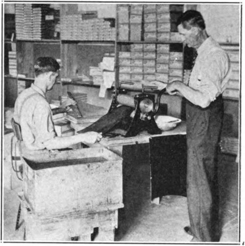 Impressing the sheets with a hand mill. Sheets were impressed with a hand mill in early days.