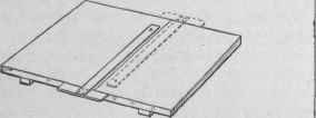 Fig. 100.   Testing the Sides of a Drawing Board.