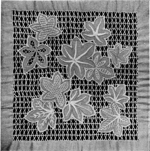 A CUSHION COVER IN BARO EMBROIDERY.