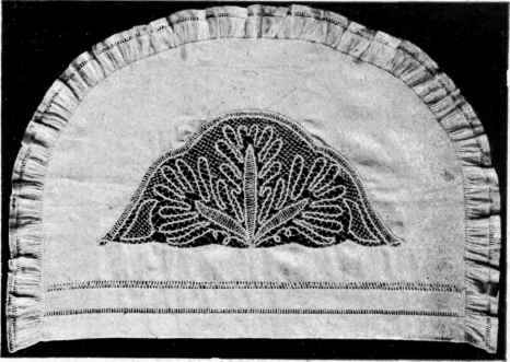 A Linen Cover for a tea cosy ornamented with Bohemian Lace.
