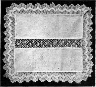 AN ECONOMICAL TRAY CLOTH WADE FROM SCRAPS.