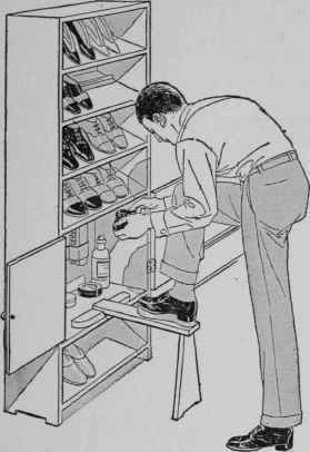 A large shoe cabinet. The bracket that holds the foot piece can be folded up and hidden behind the two doors.