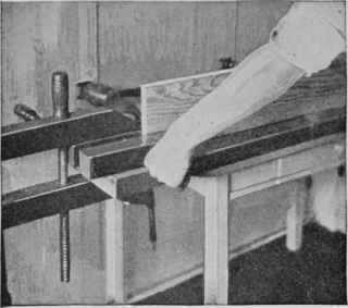 Using two hand screws as a substitute for a vise.