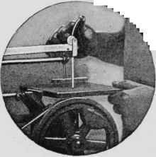 (in circle). The tension of the blade of this ma chine can be adjusted by working a lever at the top.