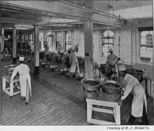 Fig. 32.   Preserving kettles in a large factory.