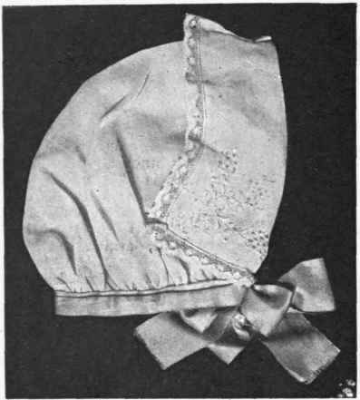A very becoming baby's bonnet made from an embroidered handkerchief