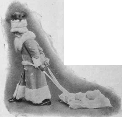 Father Christmas arriving at the party drawing his snowball laden sleigh