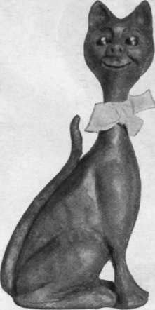 A quaint cat, modelled in plasticine over wood and wire