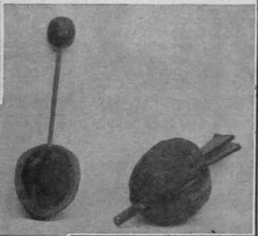 A spoon and a pair of bellows