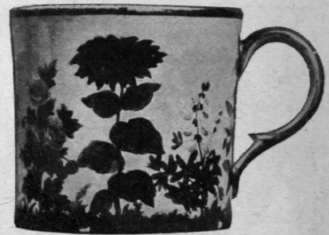 Derby coffee cup. beautifully painted with flowers and foliage in natural colours