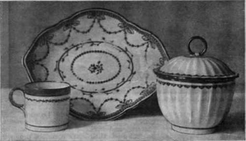 Derby teapot stand and covered sugar bowl decorated in gold; also a coffee mug with band of apple green and gold