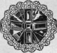 Fig. 7. Front view of the Coronation Ring of Queen Victoria and King Edward, showing the chief gem, a sapphire with a cross of St. George of five rubies, in a circlet of diamonds
