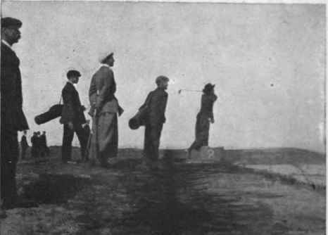 The best place to stand while an opponent makes a shot is exactly opposite her