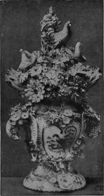 The finest known specimen of Longton Hall porcelain, a vase decorated with raised flowers and birds, painted in colours