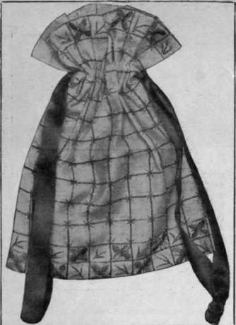 The red lines of the glass cloth are worked in stem stitch all over the material for this bag: a star is at each intersection and simple patterns at the bottom of the bag