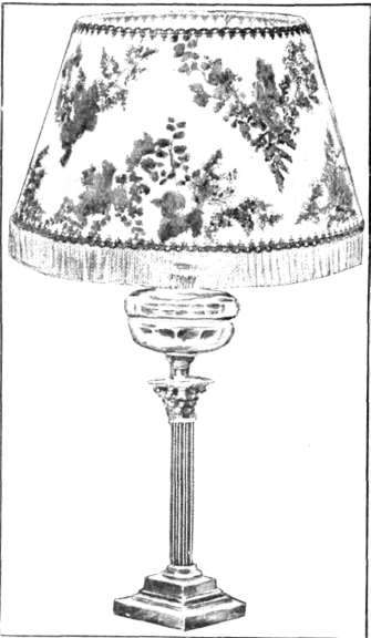 A lampshade of Australian tinted and green ferns.