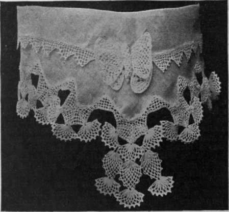 A muslin stock collar trimmed with fine crochet edging. The butterfly can be made separately and used as a motif or neck finish
