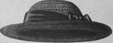 A straw hat with a removable velvet trimming, suitable for morning or country wear