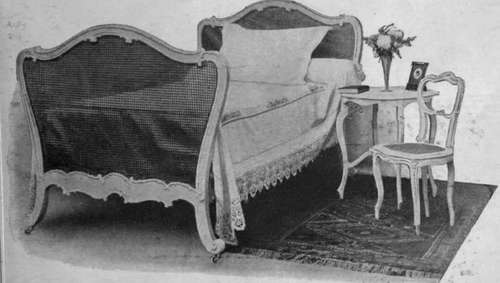 An enamelled set in the French style. If the bedstead, table, and chair match, the effect is very good. The table being enamelled white does not require a cloth