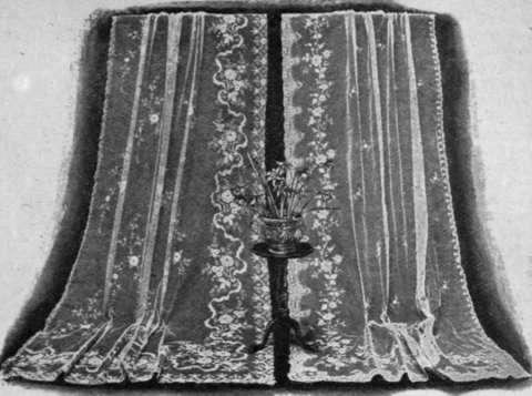 Beautiful examples of Brussels lace curtains, of the finest net and most artistic design