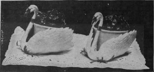 Coffee ices served in paper cases representing swans are a decorative item in the menu