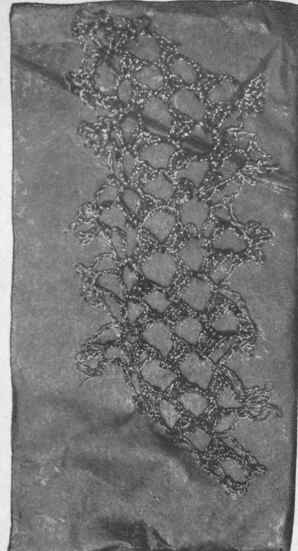 Fig.4. Worked in old gold, with the edges in copper thread, a pretty effect is produced