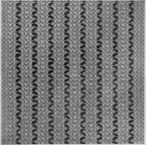 Silk huck & buck worked in black and white slik with excellent effect