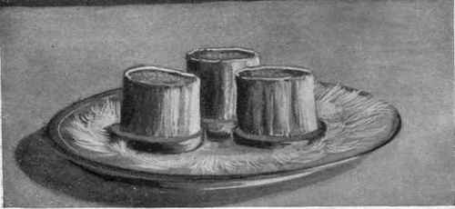 Marrow Bones Served On Round Slices Of Toast.