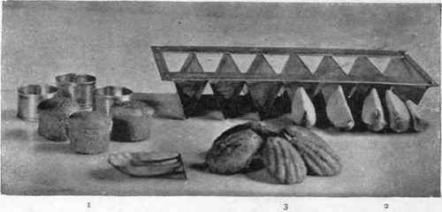 Small Pound Cakes And Tins In Which They Were Baked.