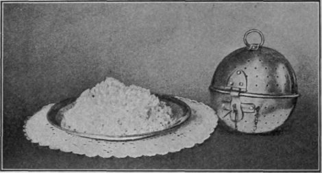 Rice Steamed in One of the Newest of Kitchen Novelties: a Rice Ball. Recipe on Page pp.