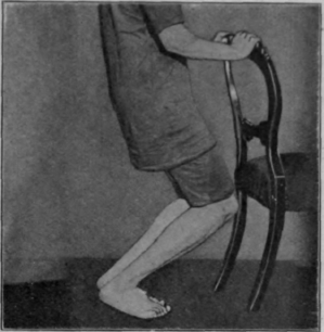 Fig. 114. To illustrate simple knee bending. Note that the body weight falls on the outer sides of the feet