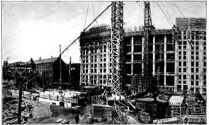 Concrete Towers and Distributing Chutes on a Large Construction Job.