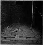 Protective Plank Flooring in a Ventilating Shaft.