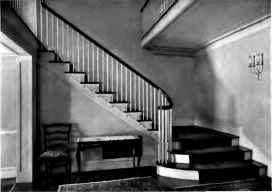 A COLONIAL HALL EXPRESSING THE QUALITIES OF SIMPLICITY