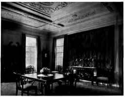 A MODERN DINING ROOM SHOWING THE GEORGIAN AND CHIPPENDALE FEELING SUCCESSFULLY AMERICANIZED AND EXPRESSED IN TERMS OF GOOD TASTE