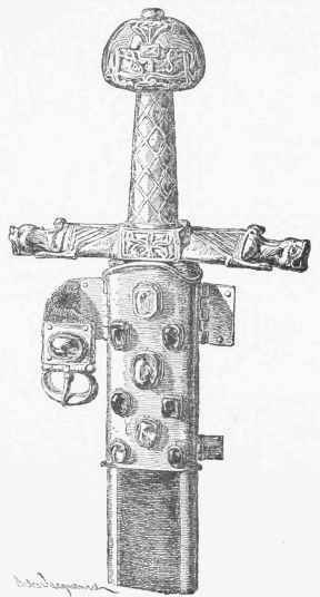 Sword of Charlemagnc, the hilt, chape, and buckle of gold, set with uncut stones. (Museum of the Louvre.)