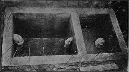 Fig. 156a Photographic reproduction of a concrete septic tank, similar to that of Fig. 153. The tank requires only the cover to make it complete.