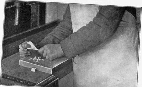 Fig. 58. Method Of Grasping The Scraper When Working Upon A Broad Surface.