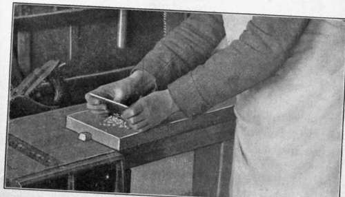 Fig. 59. Method Of Grasping Scraper The Scraper When Working Within A Small Area.
