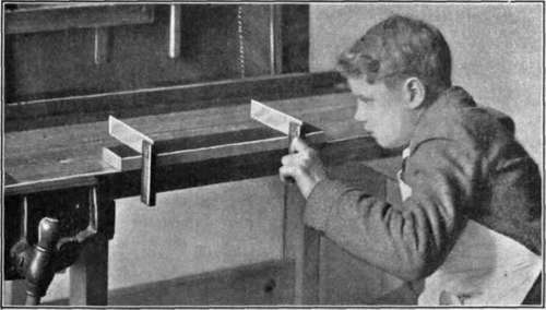 Fig. 6. Use of Two Try squares to See if Piece of Wood is Out of Wind.