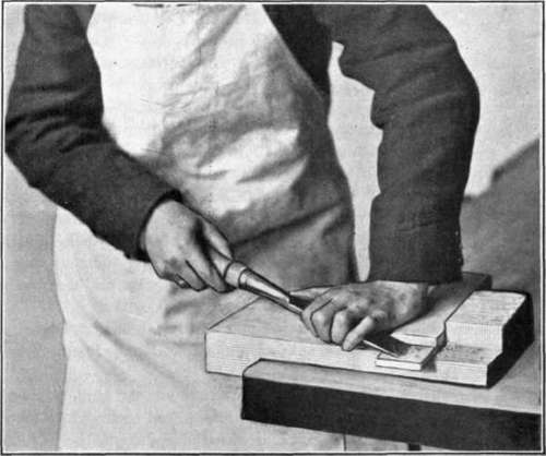 Fig. 90. Use of the Bench Hook with the Paring Chisel.