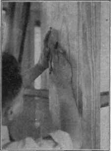 Fig. 131. Using Block to Locate Door Stop Position on Jamb