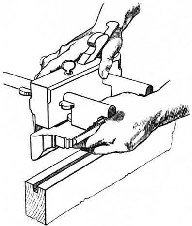 Fig. 122.   Method of using the Plough Plane.