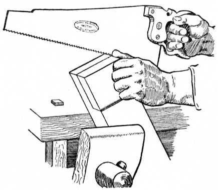Fig. 70.   Sawing the Cheek of a Halving Joint.