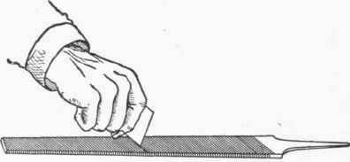 Fig. 55. Removing Pins from a File