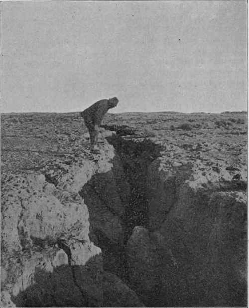 Earthquake fissure in limestone, Arizona. (U. S. G. S).