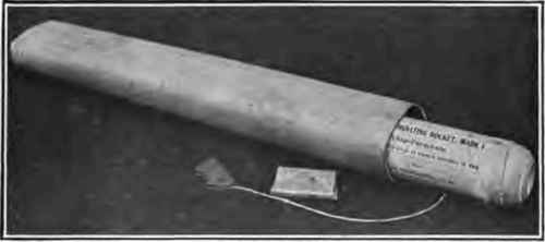 Placing rocket in wrapping carton.