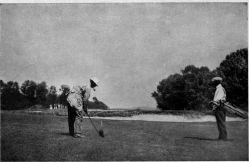 EDWARD RAY Playing an Approach Shot